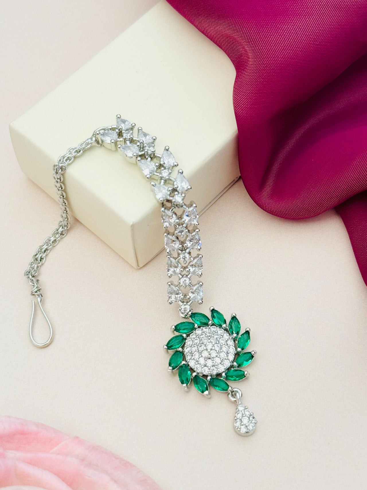 Unique Silver Plated American Diamond Maangtikka with green stones and white diamond embellishments