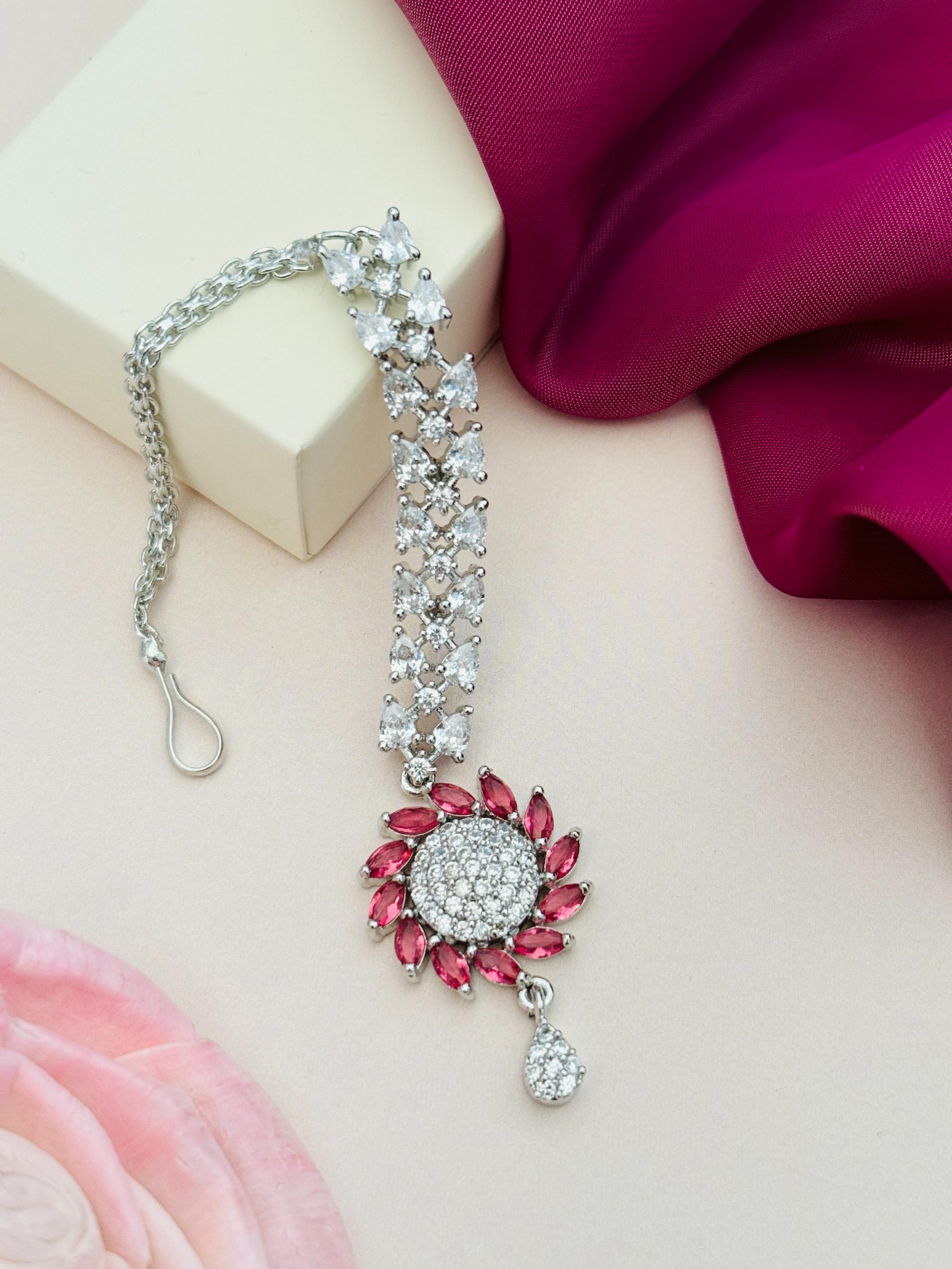 Unique Silver Plated American Diamond Maangtikka with red and clear stones by Abdesignsjewellery