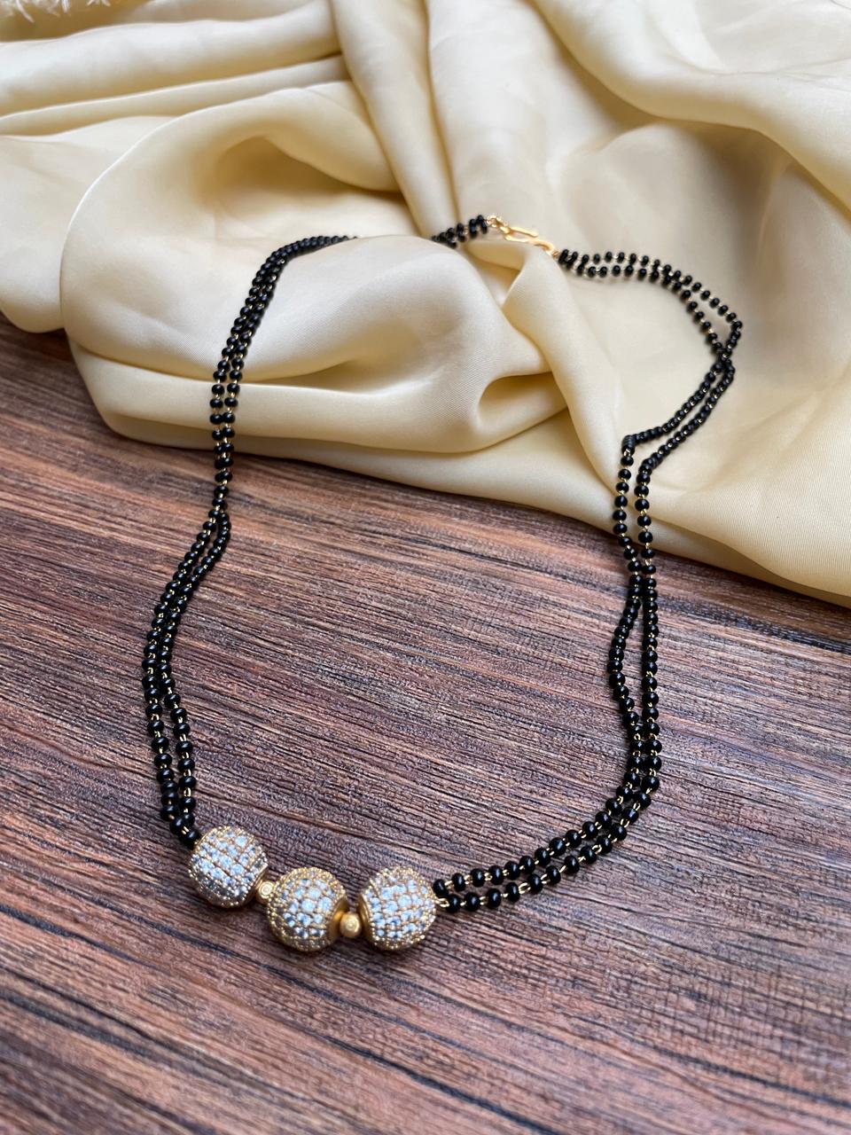 Pakhi Inspired Sleek Antique Golden Ball Mangalsutra