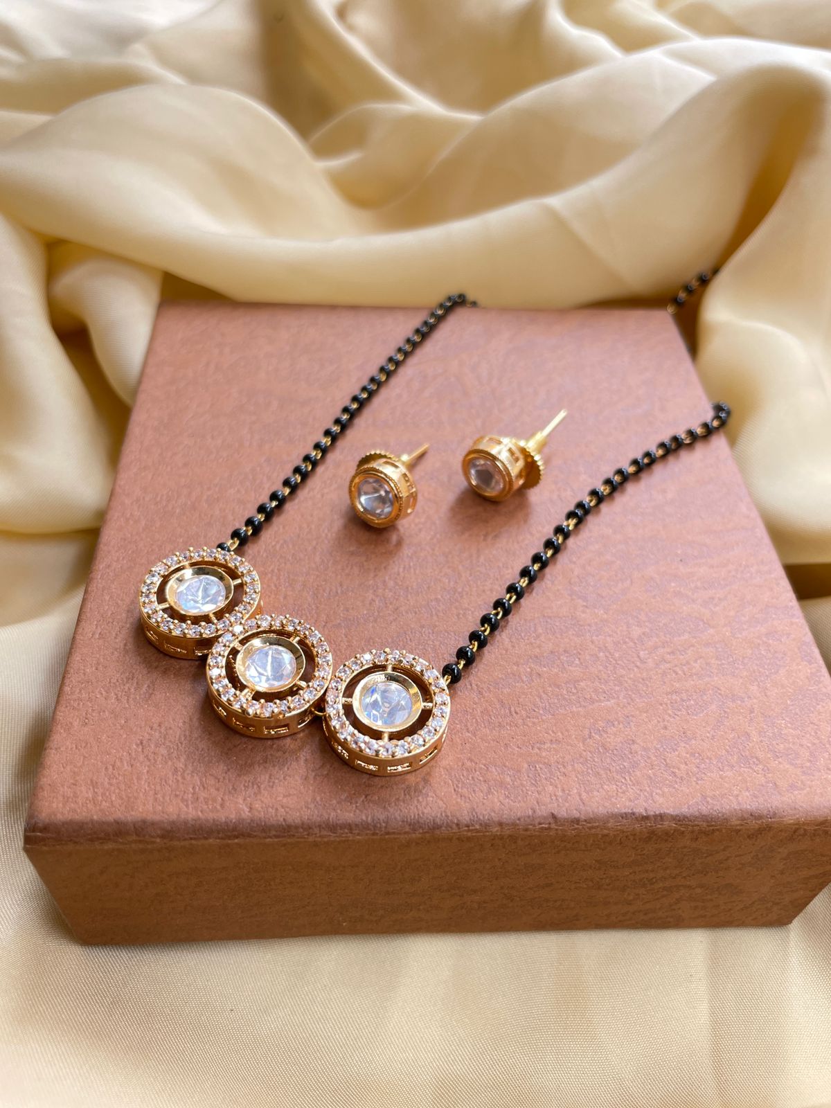 Astonishing Gold Round Stone Mangalsutra & Earrings - Abdesignsjewellery