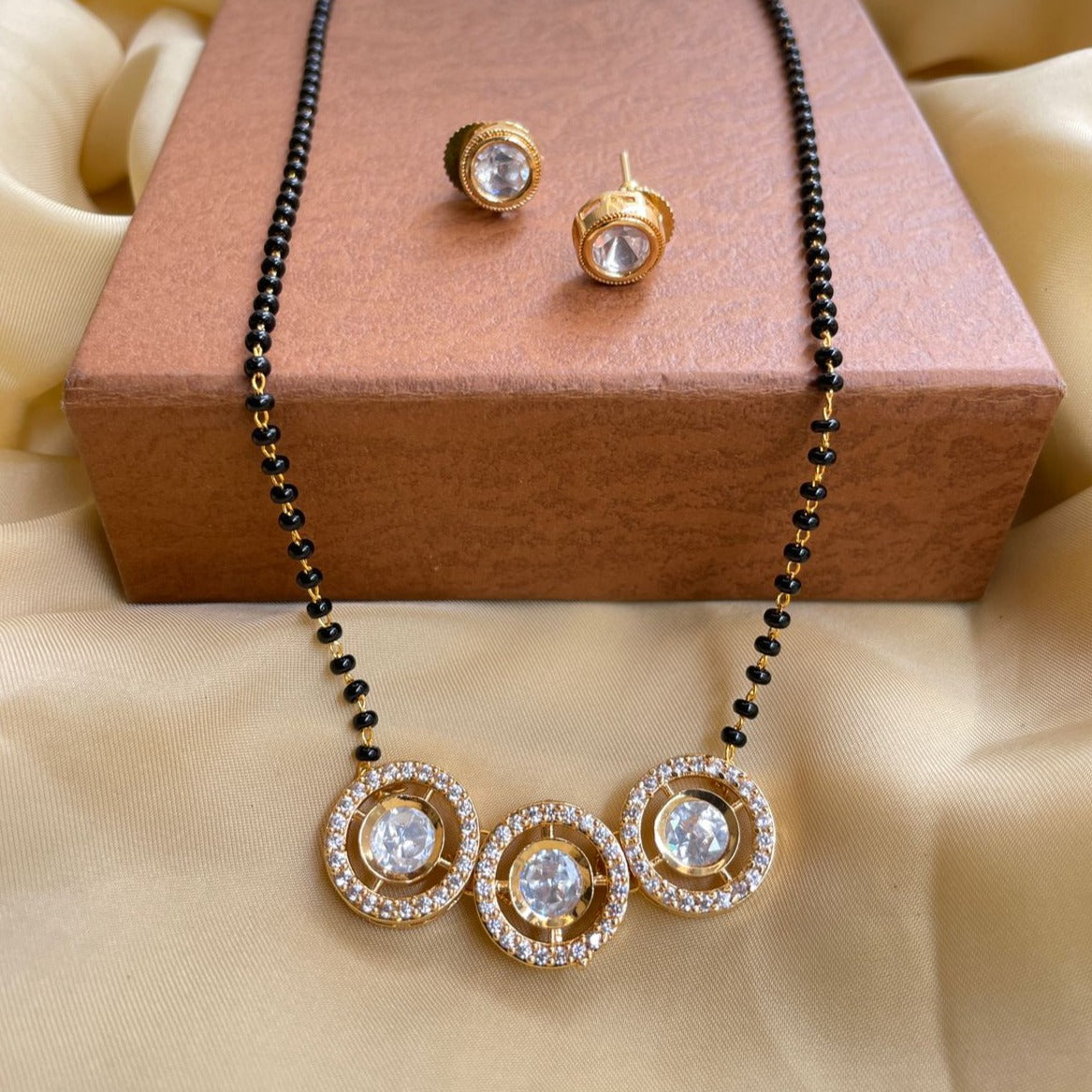 Astonishing Gold Round Stone Mangalsutra & Earrings - Abdesignsjewellery