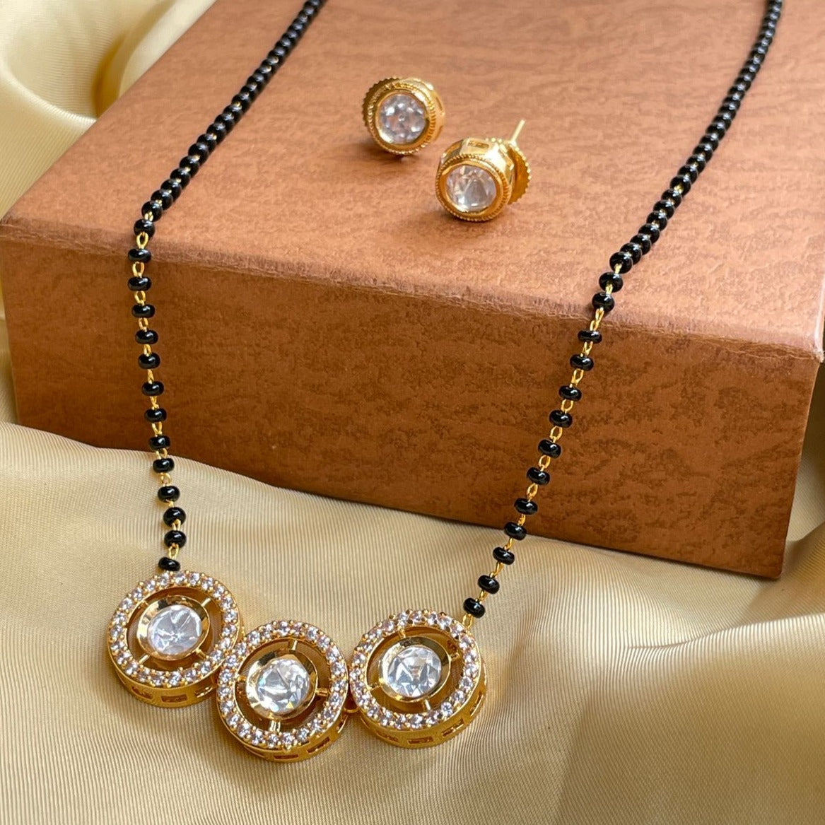 Astonishing Gold Round Stone Mangalsutra & Earrings - Abdesignsjewellery