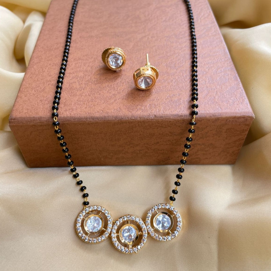 Astonishing Gold Round Stone Mangalsutra & Earrings - Abdesignsjewellery