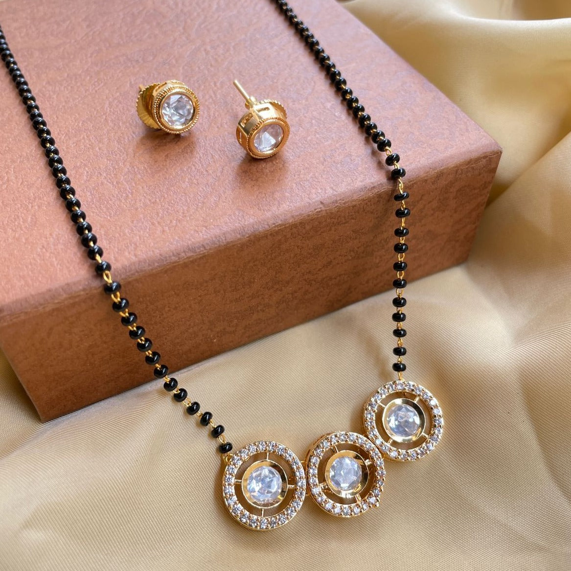 Astonishing Gold Round Stone Mangalsutra & Earrings - Abdesignsjewellery
