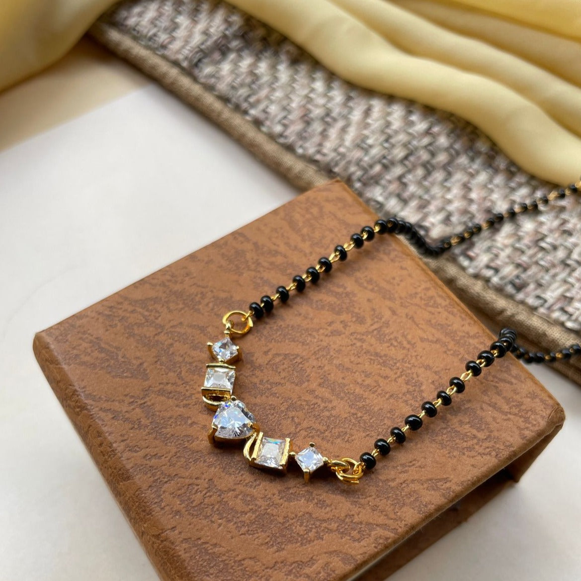 Latest Vivid Gold Heart Cz Mangalsutra