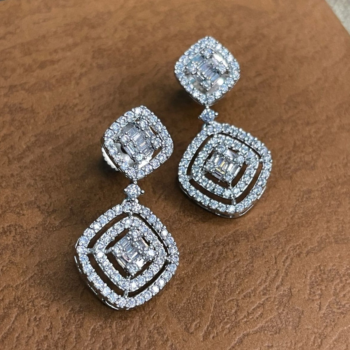 Square 4Stone Diamond Earrings in Mahidharpura , Surat , Shashvat Jewels  Pvt. Ltd. | ID: 8786344191