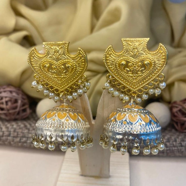 Abdesigns Gold-Silver Jhumka Earrings . Gold heart-shaped studs with filigree detailing and silver jhumka domes with pearl drops